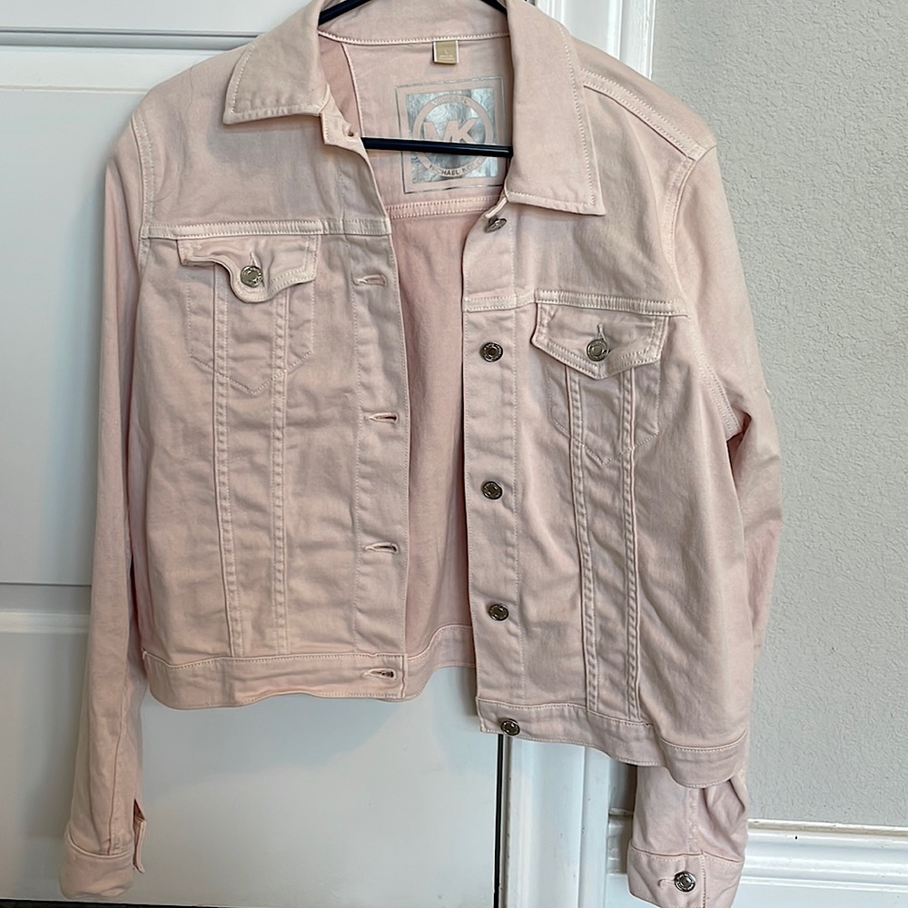 Brand new, never worn Michael Kors light pink jacket. Non smoking home.